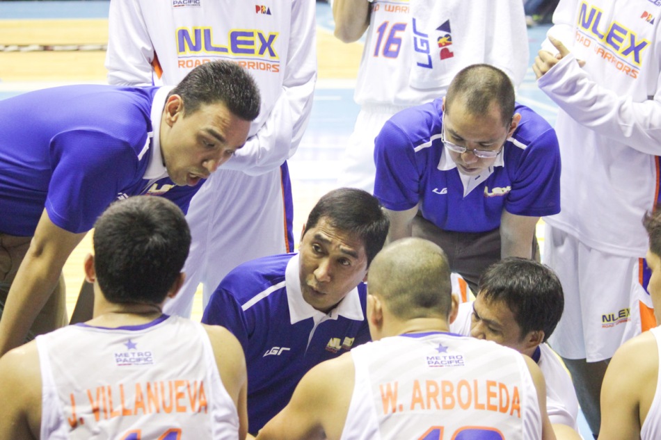 NLEX acting head Coach Adonis Tierra was calling the shots in the huddle early in the 1st quarter with him are from left: Asst Coaches Ford Arao and Sandy Arespacochaga. Catch PBA games live in SMART ARANETA Coliseum. If not you can watch the PBA’s 40th season live airing on TV5 five times a week on TUES, WED and FRI, with the first game at 4:15 p.m. and the second game at 7 p.m.; on SAT at 5 p.m.; and SUN at 3 p.m. and 5 p.m. Photo by Jude Bautista